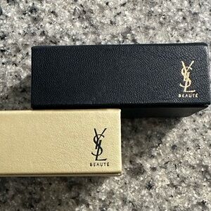 Yves Saint Laurent lipstick cases.